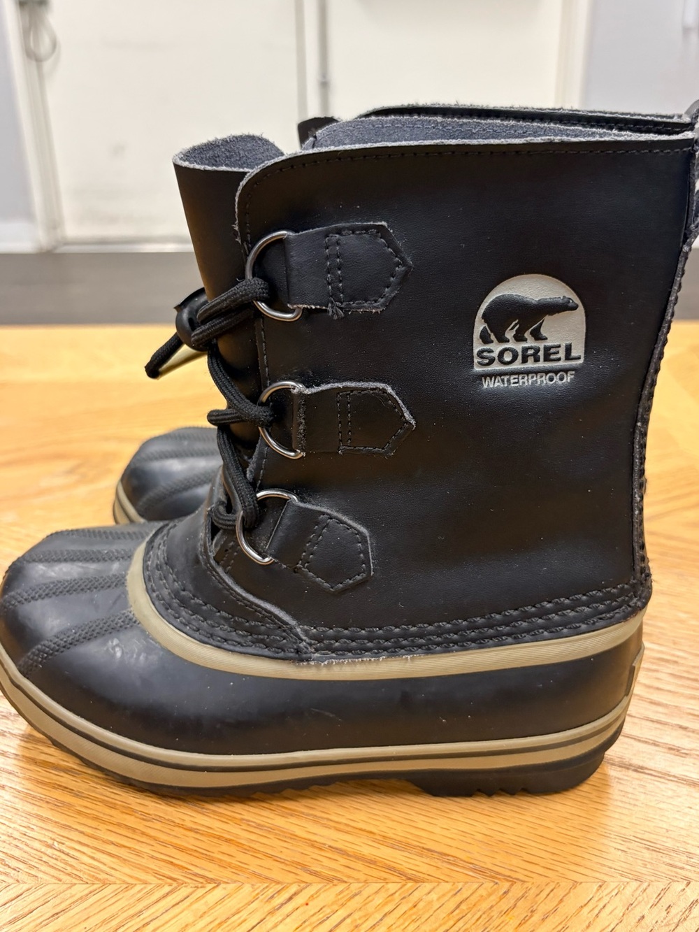 Sorel Kids Black and Tan Waterproof Snow Boots